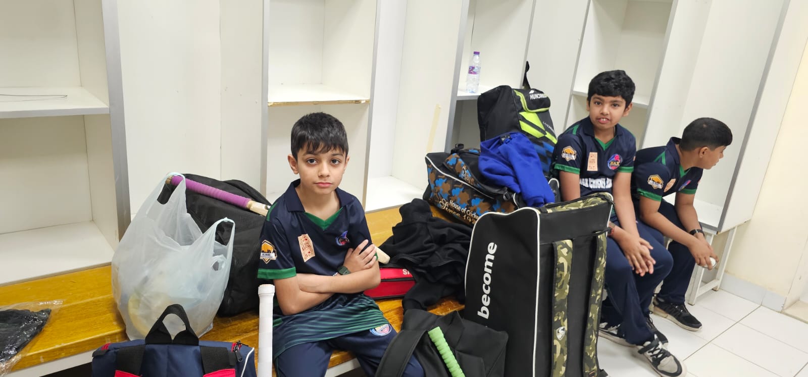 MAX Cricket Academy players with kit bags and equipment